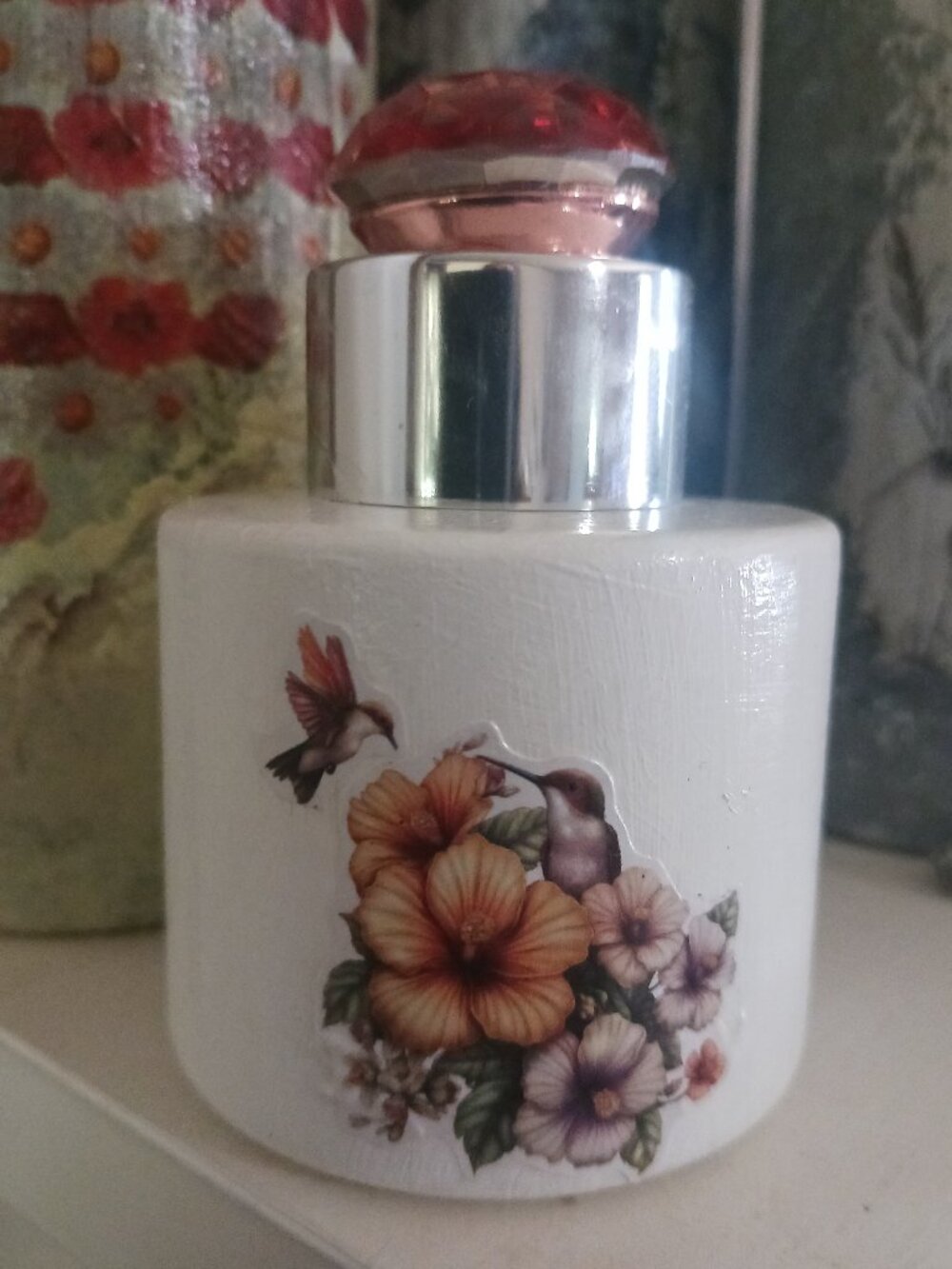 Hummingbird floral decorated bottle